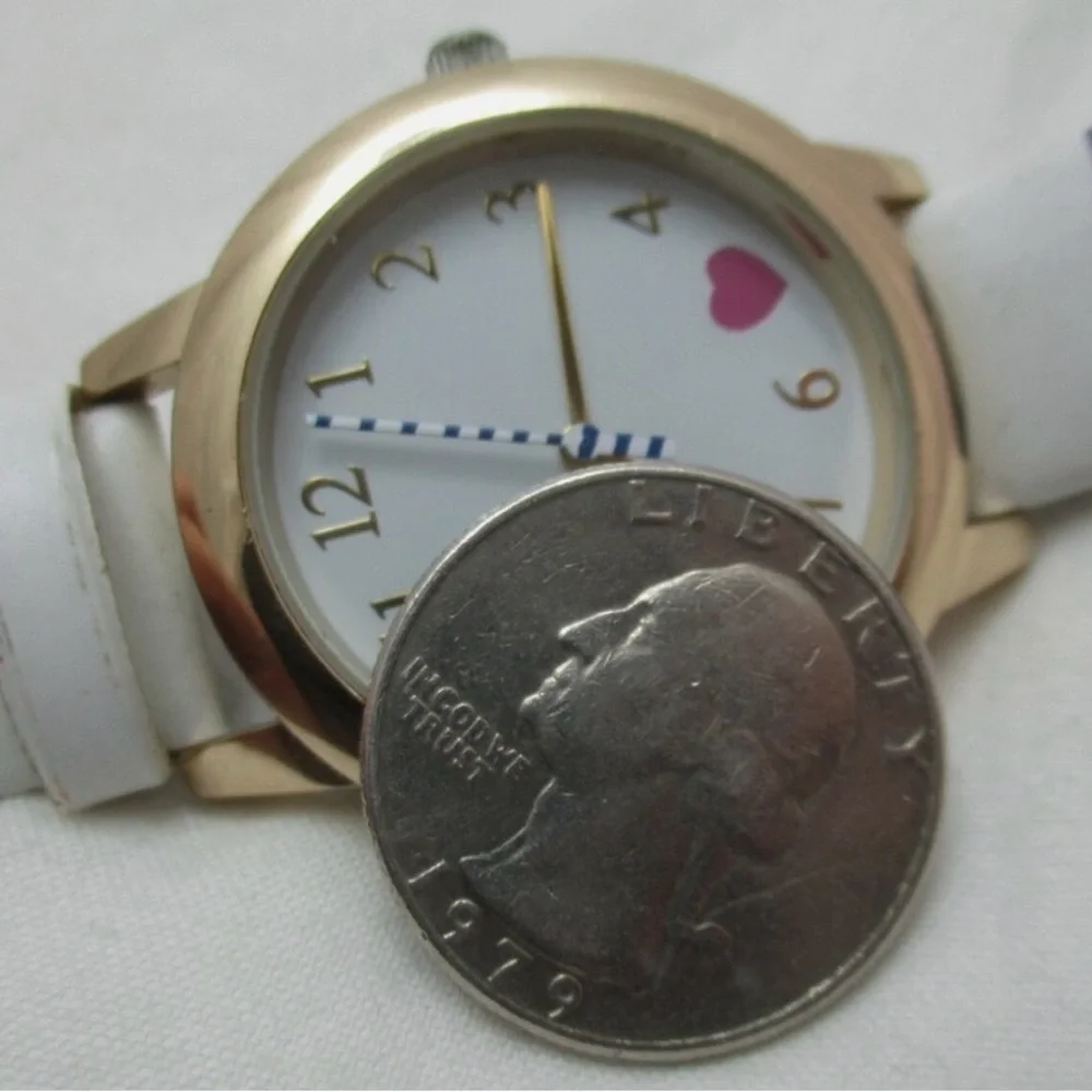 🕰️ Calvin Hill Navy & White Striped Watch – Gold Tone – Heart Detail